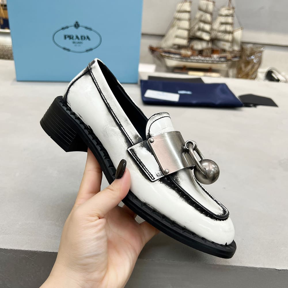 PRADA Brushed leather loafers with metal details